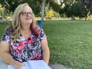 Julie JordanScott looks to heaven as she takes a pause in her writing.