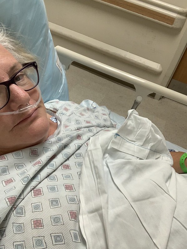 Julie JordanScott in the hospital while she was battling pneumonia, sepsis and multiple organ failure.