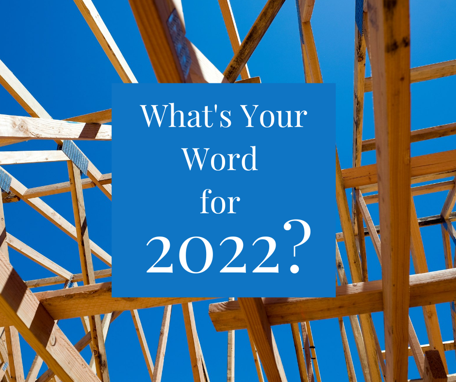 Framework of a home being built and the words "What's Your Word for 2022"?