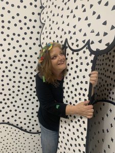 Woman hugging a cartoon tree - white with black polka dots