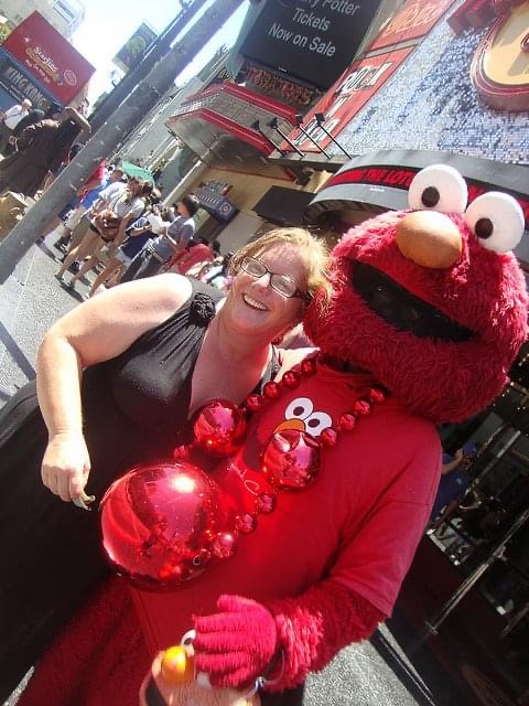 On Hollywood Boulevard, tourists like me get their photos taken with characters like Elmo. This one was only slightly creepy but wait - what is this thing on his wrist?!